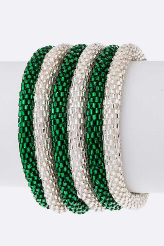 This set includes six handcrafted roll-up bracelets, each measuring 0.25" in width. Made in Nepal, these non-stretch bracelets offer a unique and stylish accessory to enhance your look.